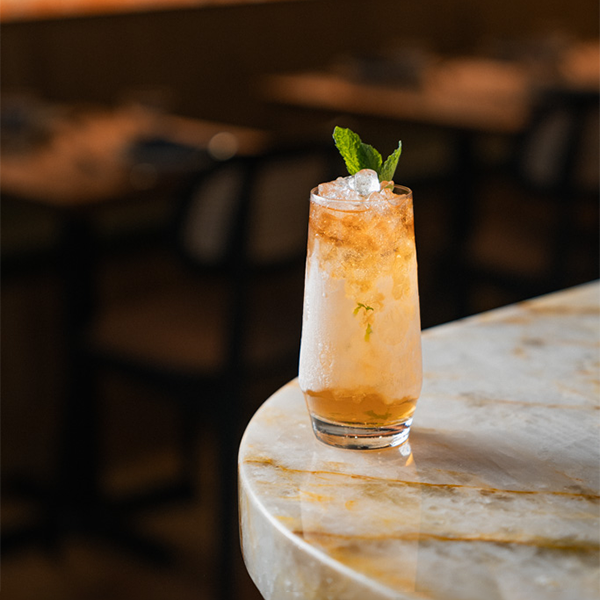 The Mountain Mint Julep's herbaceousness pairs well with Cherry & Fennel salad. CARTER HIYAMA