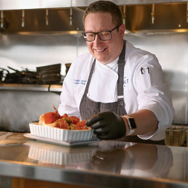 Galt House Hotel's executive chef Kendall Linhart prepares his take on the Hot brown.  JESSICA EBELHAR