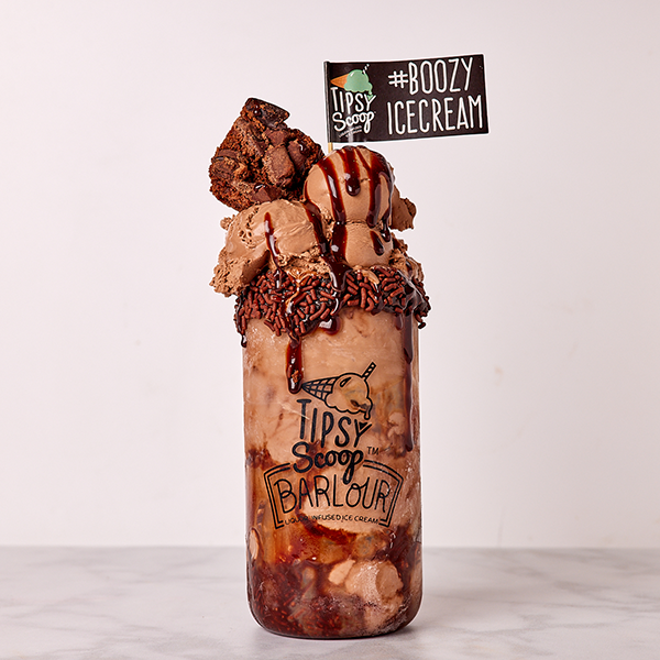 Tipsy Scoop's Whiskey Dreams sundae made with whiskey-infused dark chocolate salted caramel ice cream.
