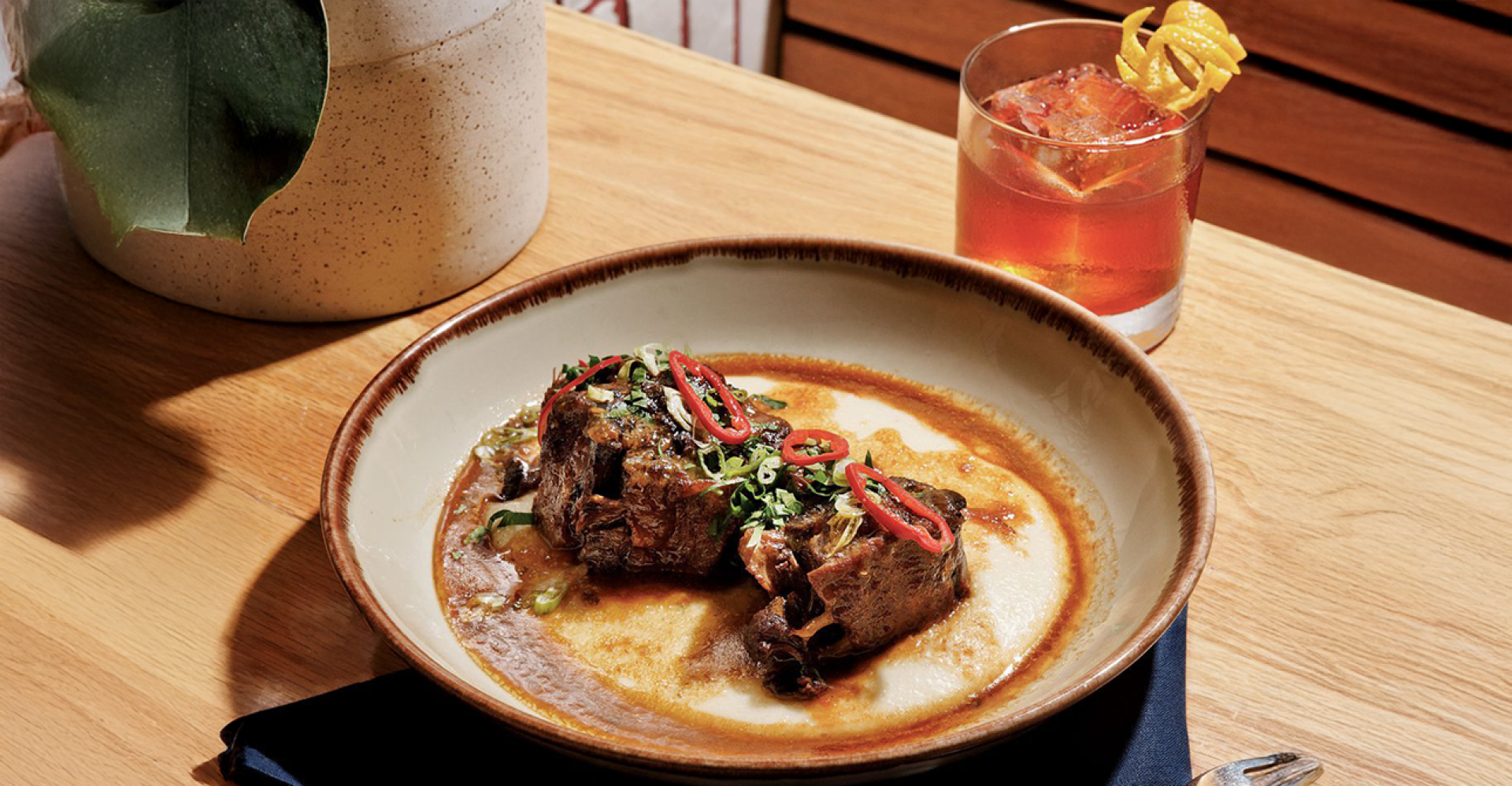 Braised Oxtail and Grits Paired With Whiskey