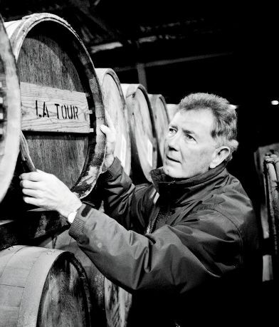 Master distiller Jim McEwan examines a LaTour barrel, one of the many cask types he used to finish the mature Bruichladdich stock to create new expressions RODDY MACKAY