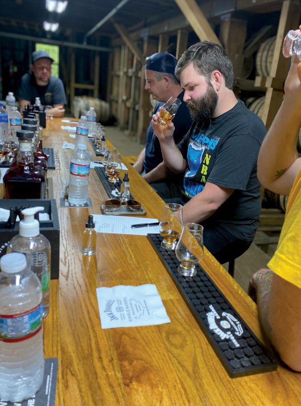 Deliberation as single barrel samples are tasted at Jack Daniel. FRUGAL MACDOOGAL