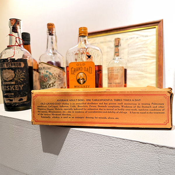 Some of the pre-Prohibition bottles in Bill Carmean's collection were excluded from the sale catalog due to low fill levels.